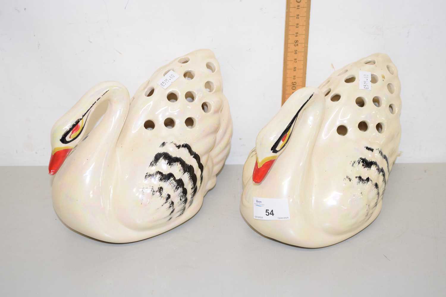 Lot 54 - Two flower holders modelled as swans with...