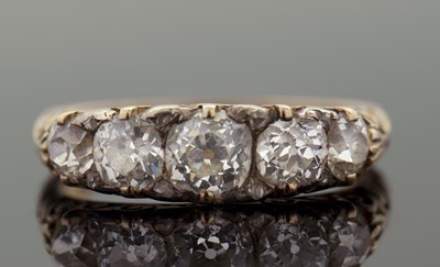 Lot 272 - A five stone diamond ring, the five graduated...