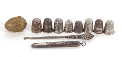 Lot 207 - Mixed Lot:  Four hallmarked silver thimbles,...
