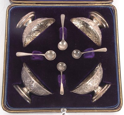 Lot 231 - A cased Victorian silver set of four pedestal...
