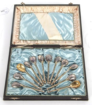 Lot 235 - A boxed set of twelve Russian silver niello...