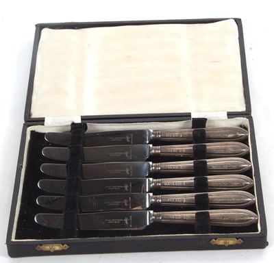 Lot 247 - A cased set of six silver handled tea knives,...