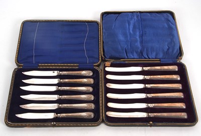 Lot 249 - Two cased sets of silver handled tea knives,...