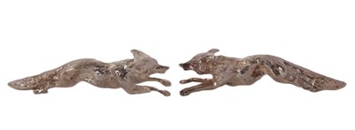 Lot 254 - A pair of vintage cast metal knife rests in...
