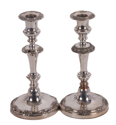 Lot 267 - A pair of old Sheffield plated candlesticks,...