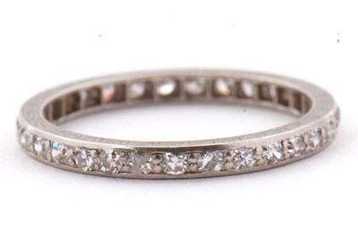 Lot 29 - A diamond eternity ring, the full hoop...