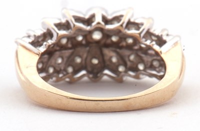 Lot 69 - A 9ct diamond cluster ring, set throughout...