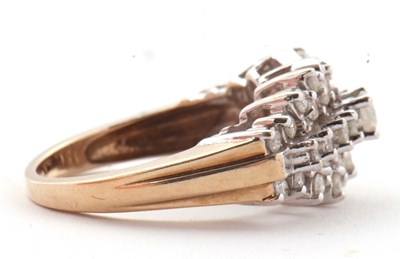 Lot 69 - A 9ct diamond cluster ring, set throughout...