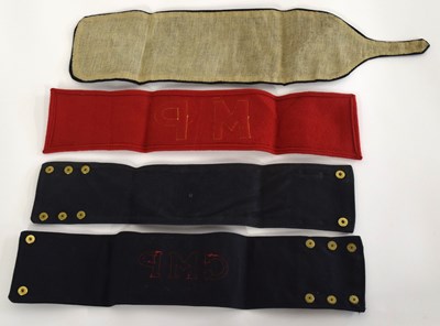 Lot 58 - Quantity of Four Military police armbands to...