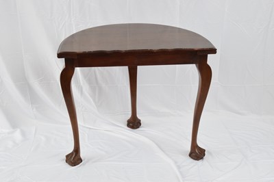 Lot 186 - Edwardian mahogany demi-lune side table raised...