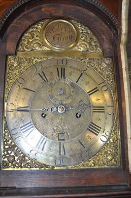 Lot 467 - A Georgian long case clock with arched brass...