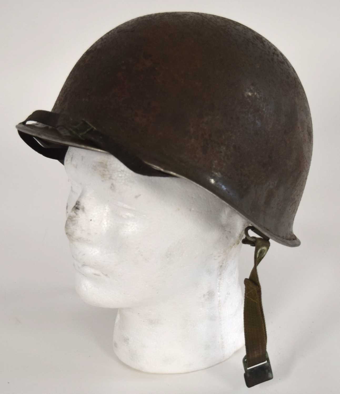 Lot 95 - Second World War American M1 steel helmet with...