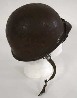 Lot 95 - Second World War American M1 steel helmet with...