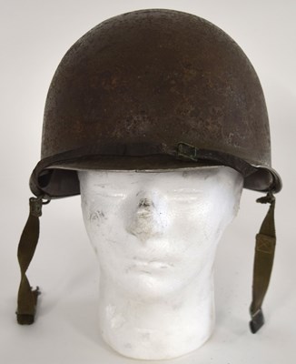 Lot 95 - Second World War American M1 steel helmet with...