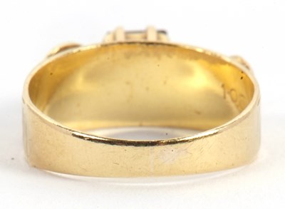 Lot 51 - A sapphire and diamond ring, the central...