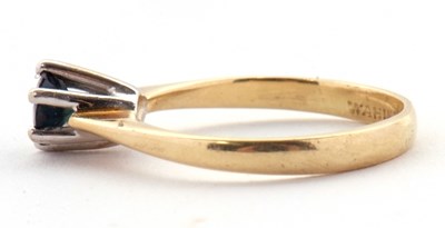 Lot 32 - A single stone sapphire ring, the round...