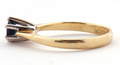 Lot 32 - A single stone sapphire ring, the round...