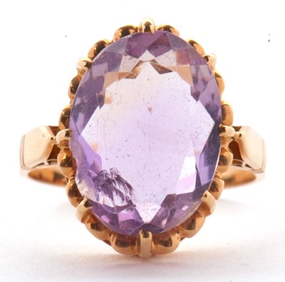 Lot 34 - An amethyst ring, the oval amethyst in a...