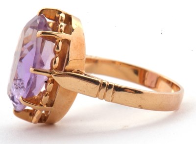 Lot 34 - An amethyst ring, the oval amethyst in a...