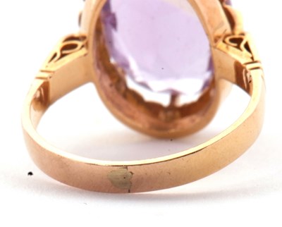 Lot 34 - An amethyst ring, the oval amethyst in a...