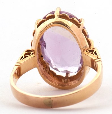 Lot 34 - An amethyst ring, the oval amethyst in a...