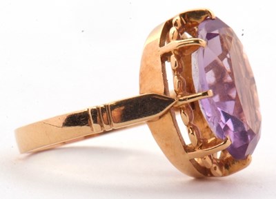 Lot 34 - An amethyst ring, the oval amethyst in a...