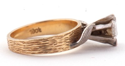 Lot 31 - A diamond solitaire ring, the round brilliant...