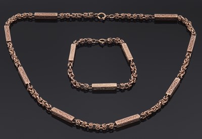 Lot 289 - A rose gold chain and matching bracelet,...