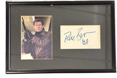 Lot 71 - A framed and glazed photograph and autographs...