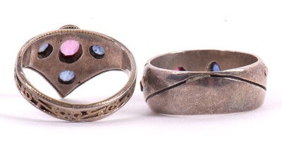 Lot 54 - Two gemset rings: to include a triangular...