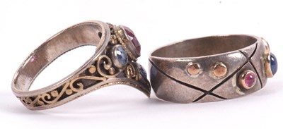 Lot 54 - Two gemset rings: to include a triangular...