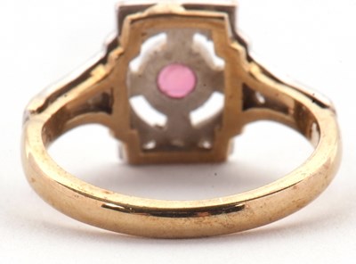 Lot 42 - A 9ct ruby and diamond ring, the central...