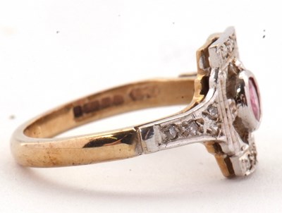 Lot 42 - A 9ct ruby and diamond ring, the central...