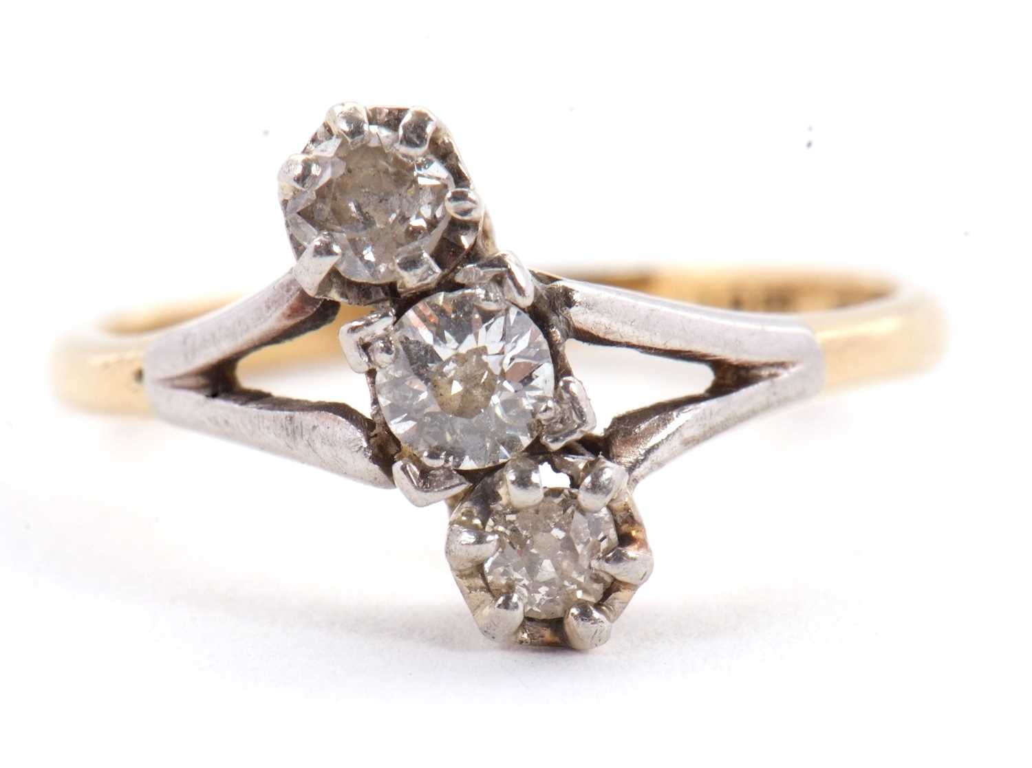 Lot 44 - A three stone diamond ring, the three old mine...