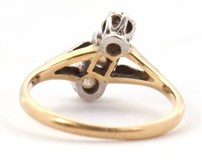 Lot 44 - A three stone diamond ring, the three old mine...