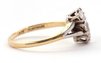 Lot 44 - A three stone diamond ring, the three old mine...
