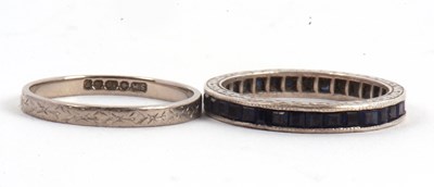 Lot 52 - Two rings: to include a sapphire eternity ring,...