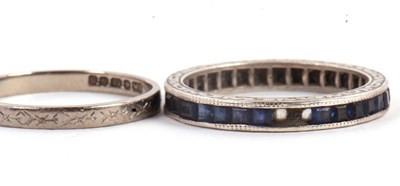 Lot 52 - Two rings: to include a sapphire eternity ring,...