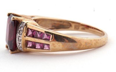 Lot 81 - A 9ct rhodolite garnet and diamond ring, the...