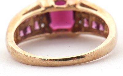 Lot 81 - A 9ct rhodolite garnet and diamond ring, the...