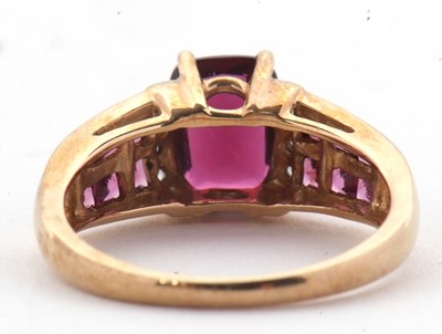 Lot 81 - A 9ct rhodolite garnet and diamond ring, the...