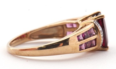 Lot 81 - A 9ct rhodolite garnet and diamond ring, the...