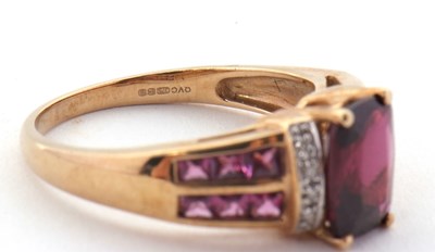 Lot 81 - A 9ct rhodolite garnet and diamond ring, the...