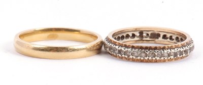 Lot 55 - Two rings: to include an 18ct wedding band...