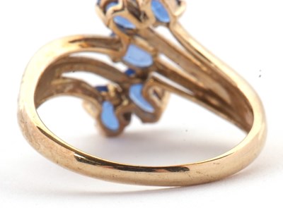 Lot 75 - A 9ct blue stone ring, set with five oval blue...