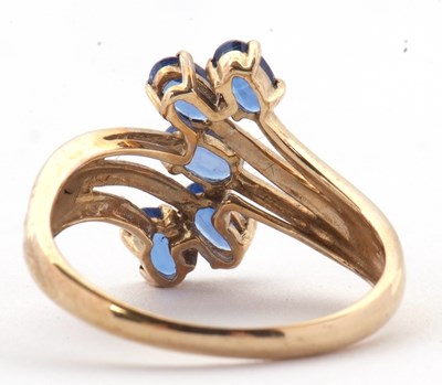 Lot 75 - A 9ct blue stone ring, set with five oval blue...