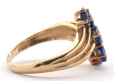 Lot 75 - A 9ct blue stone ring, set with five oval blue...