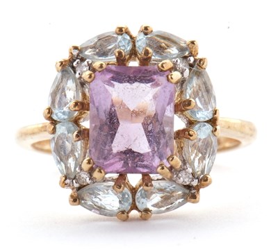Lot 80 - A 9ct amethyst, topaz and diamond ring, the...