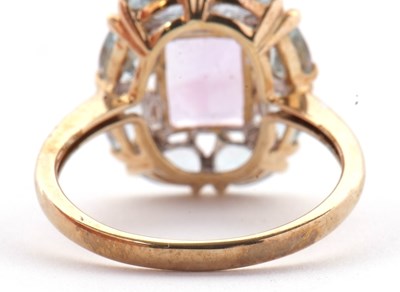 Lot 80 - A 9ct amethyst, topaz and diamond ring, the...
