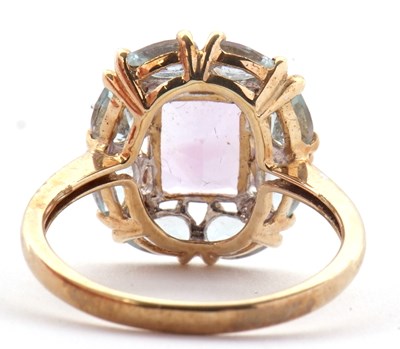 Lot 80 - A 9ct amethyst, topaz and diamond ring, the...
